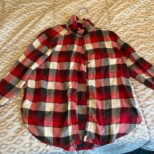 A red, grey and white American Eagle flannel
